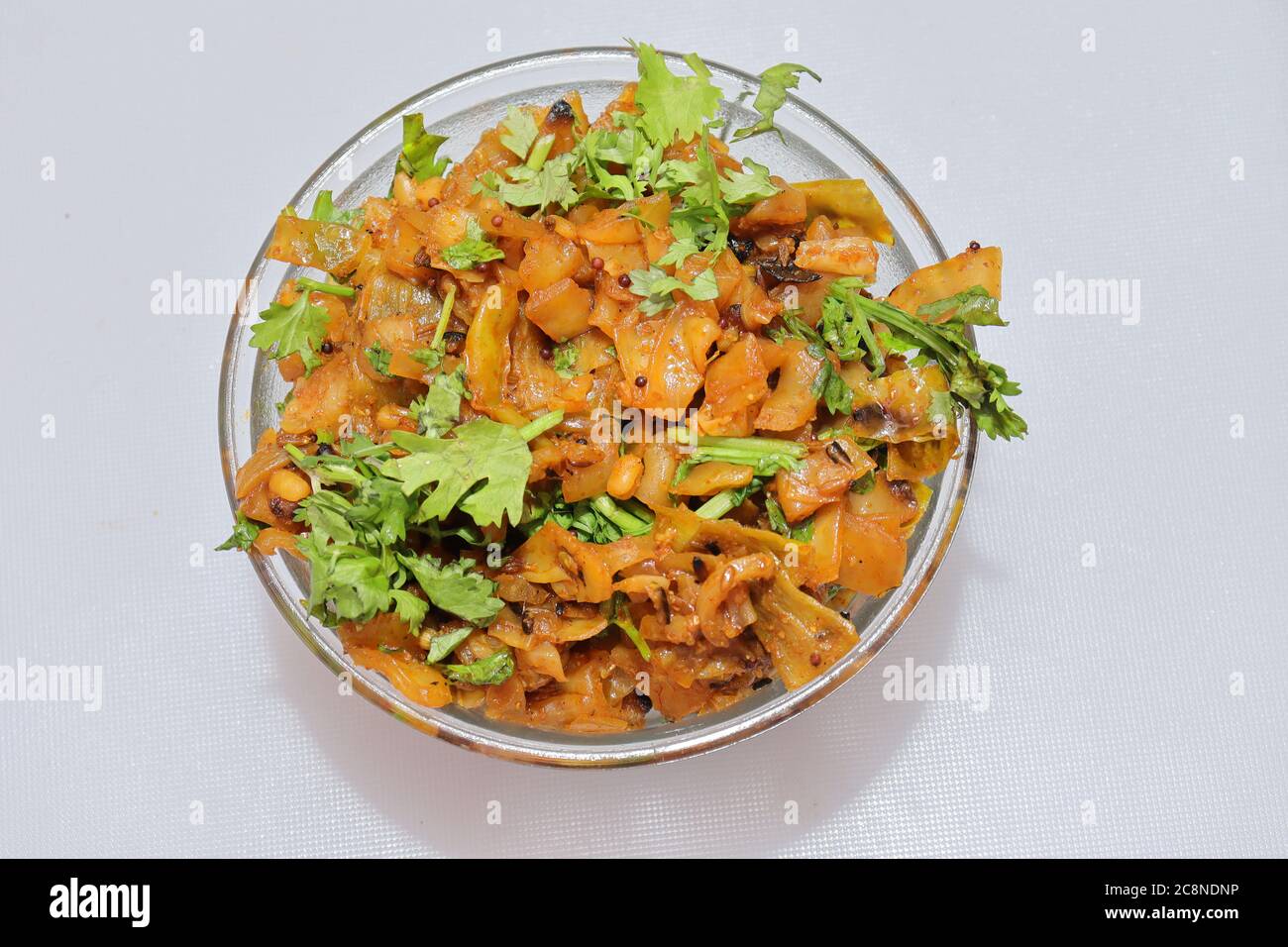 Cabbage vegetables curry on a white background Stock Photo Alamy