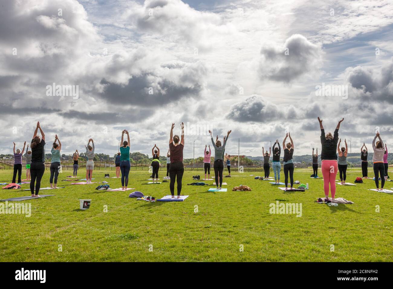 Cork City, Cork, Ireland. 26th July, 2020. Participants taking part in an outdoor fundraising yoga class  that was run by Yoga Republic with proceeds in aid of Dog Action Welfare at  Tramore Valley Park, Cork, Ireland.   - Credit; David Creedon / Alamy Live News Stock Photo