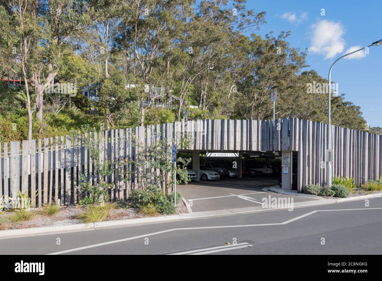 The Church Point, Sydney car park designed and built in 2018 by Ward Group uses eucalyptus vertical timber to blend in naturally into its surroundings Stock Photo