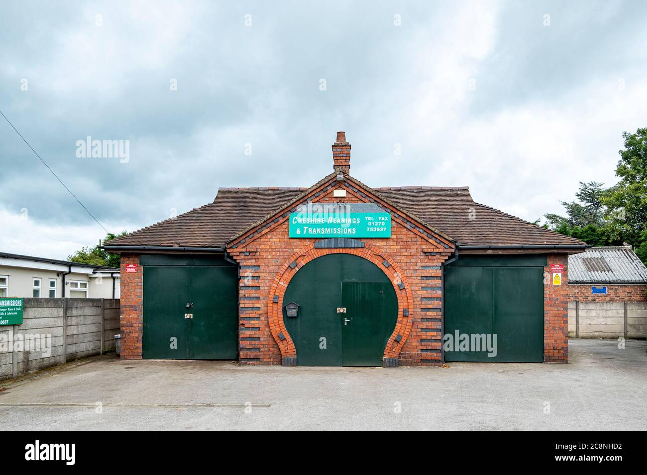 Horse shoe shape entrance to former blacksmith workshop in Elworth Sandbach Cheshire UK Stock Photo