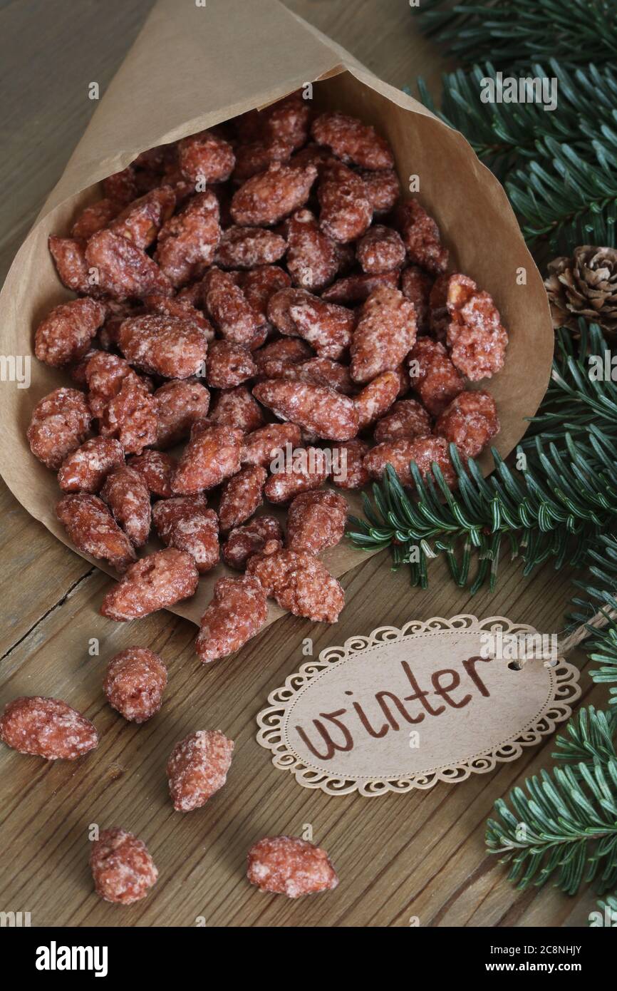 roasted almonds in the paper bag Stock Photo Alamy
