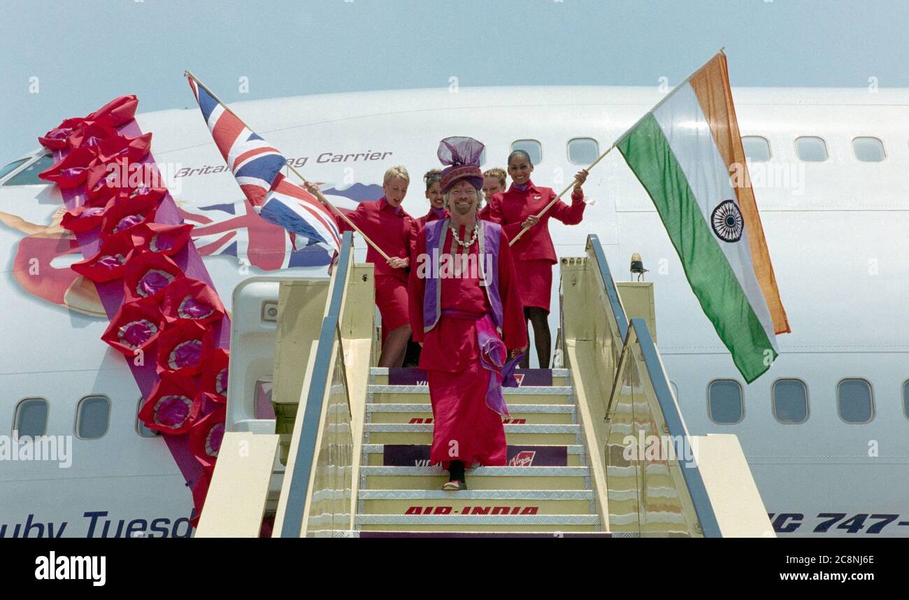 Virgin Atlantic airlines boss Sir Richard Branson celebrating the airlines inaugural flight to Dehli in 2000. Stock Photo