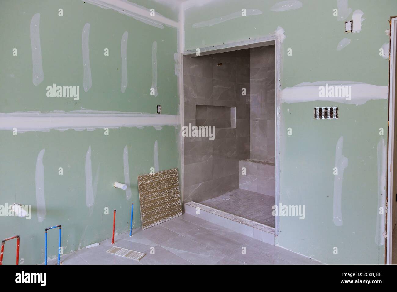 Master Bathroom with new under construction bathroom interior drywall