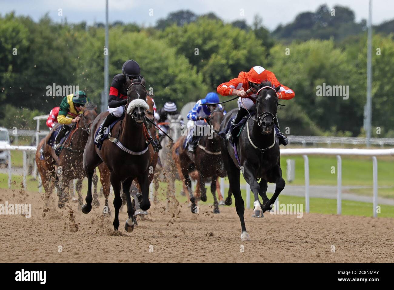 Jojo Rabbit and jockey Luke Morris (right) coming home to win the Sky Sports Racing Sky 415 Novice Stakes at Wolverhampton Racecourse. Stock Photo