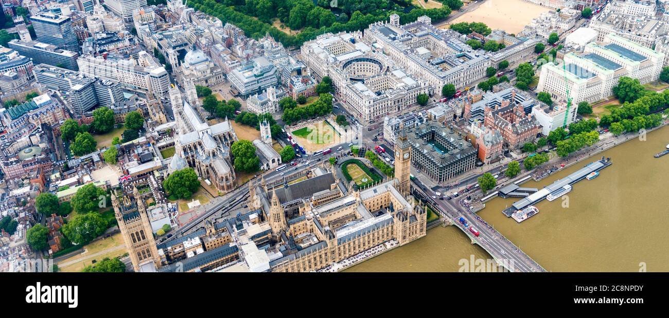 London. Helicopter view of Westminster Palace and Bridge on a beautiful summer day. Stock Photo