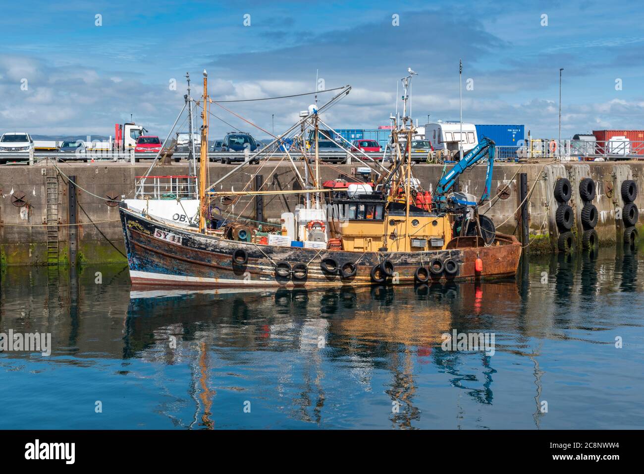 MALLAIG HARBOUR LOCHABER WEST COAST SCOTLAND MOORED WOODEN FISHING BOAT THE NORTHERN STAR Stock Photo