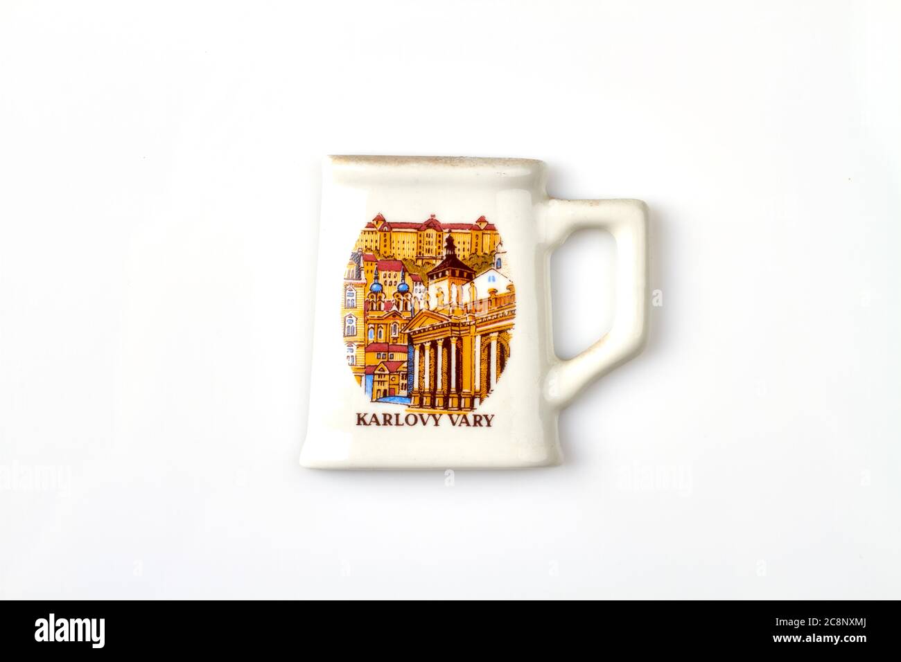 White cup with Karlovy vary image. Stock Photo