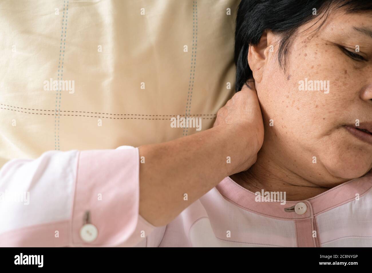 neck and shoulder pain of old woman, healthcare problem of senior concept Stock Photo
