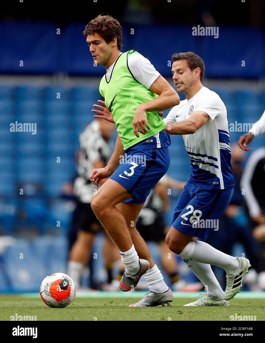Chelsea's Marcos Alonso (left) and Cesar Azpilicueta warm up before the ...