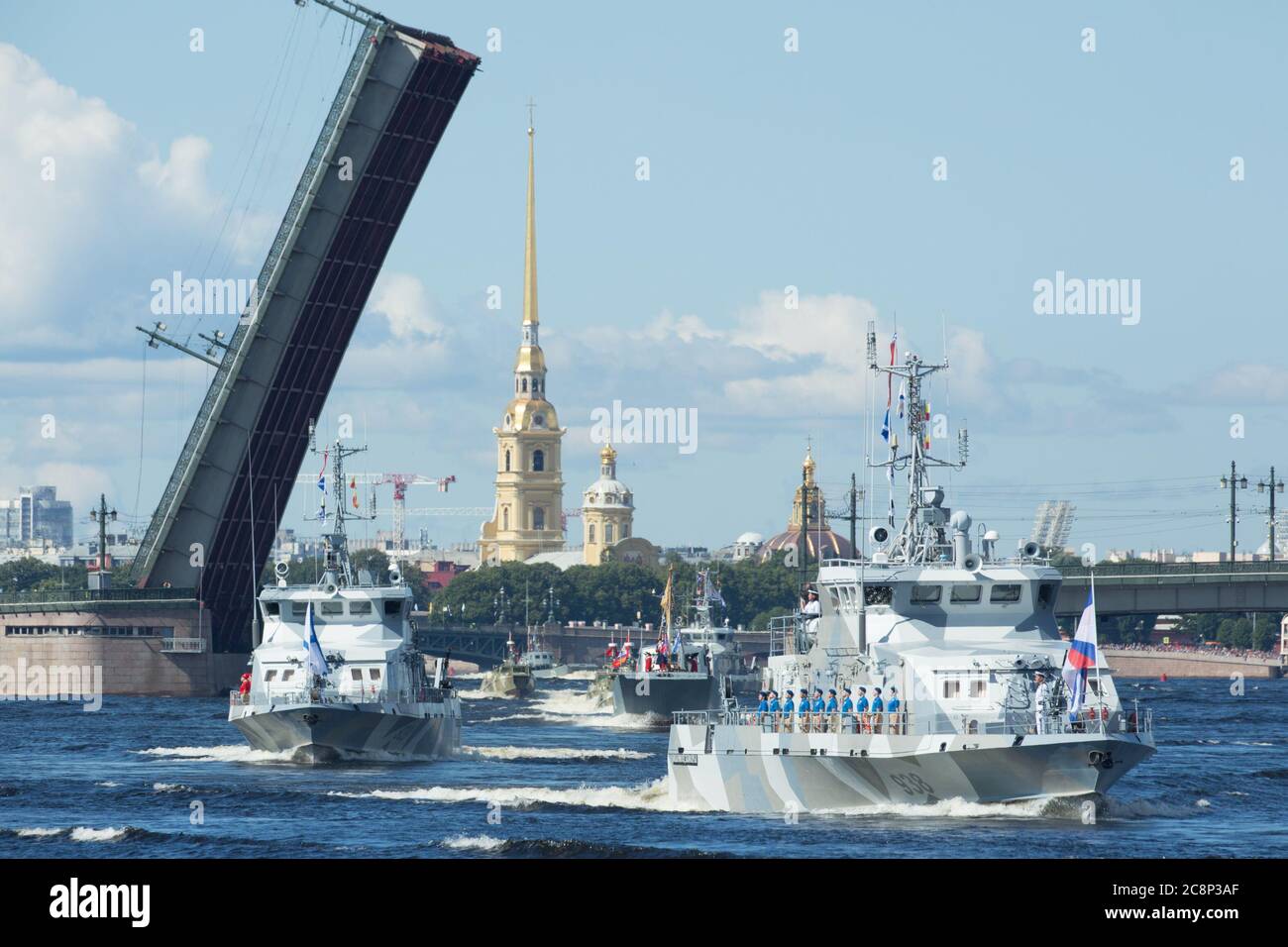 Moscow, Russia. 26th July, 2020. Russian navy ships sail during a military parade to celebrate Russian Navy Day in St. Petersburg, Russia, July 26, 2020. The naval parade in St. Petersburg involved 46 ships and submarines, more than 40 planes and helicopters, and over 4,000 servicemen. Smaller celebrations were held in the country's other fleet bases. Russia marks its Navy Day annually on the last Sunday of July. Credit: Irina Motina/Xinhua/Alamy Live News Stock Photo