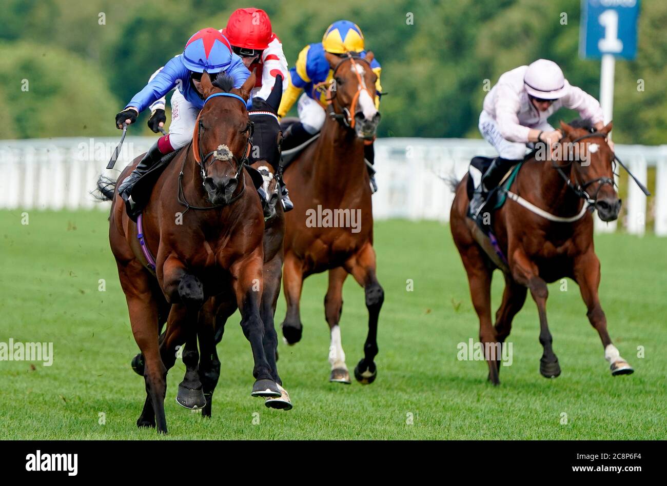 Makram ridden by jockey Oisin Murphy (left) on their way to win The Betfred Treble Odds On Lucky 15's Handicap at Ascot Racecourse. Stock Photo