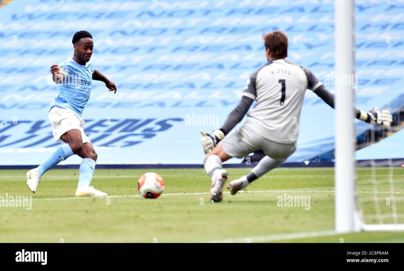 Manchester City's Raheem Sterling scores his sides third goal during the Premier League match at the Etihad Stadium, Manchester. Stock Photo