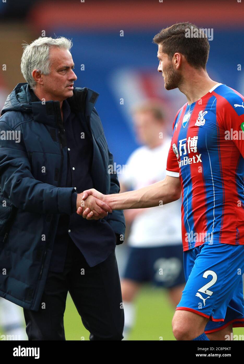 Tottenham Hotspur manager Jose Mourinho greets Crystal Palace's Joel Ward after the final whistle during the Premier League match at Selhurst Park, London. Stock Photo