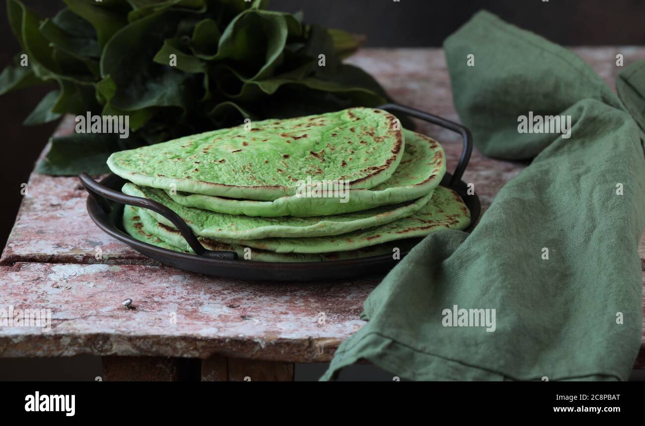 green pita bread with spinach for a healthy diet Stock Photo - Alamy