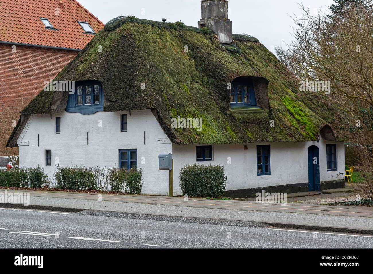old apartment building, thatched roof. Housing in Europe Stock Photo Alamy