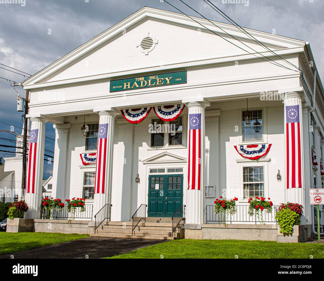 The Hadley, Massachusetts, Town Hall draped in flags to celebrate