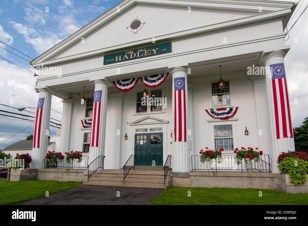The Hadley, Massachusetts, Town Hall draped in flags to celebrate