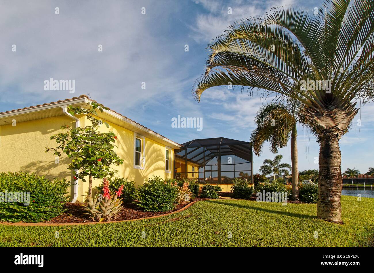 House Exterior Yellow Landscaping Border Grass Lanai Screening Panoramic Cage Palm Trees Florida Usa Punta Gorda Fl Pr Stock Photo Alamy