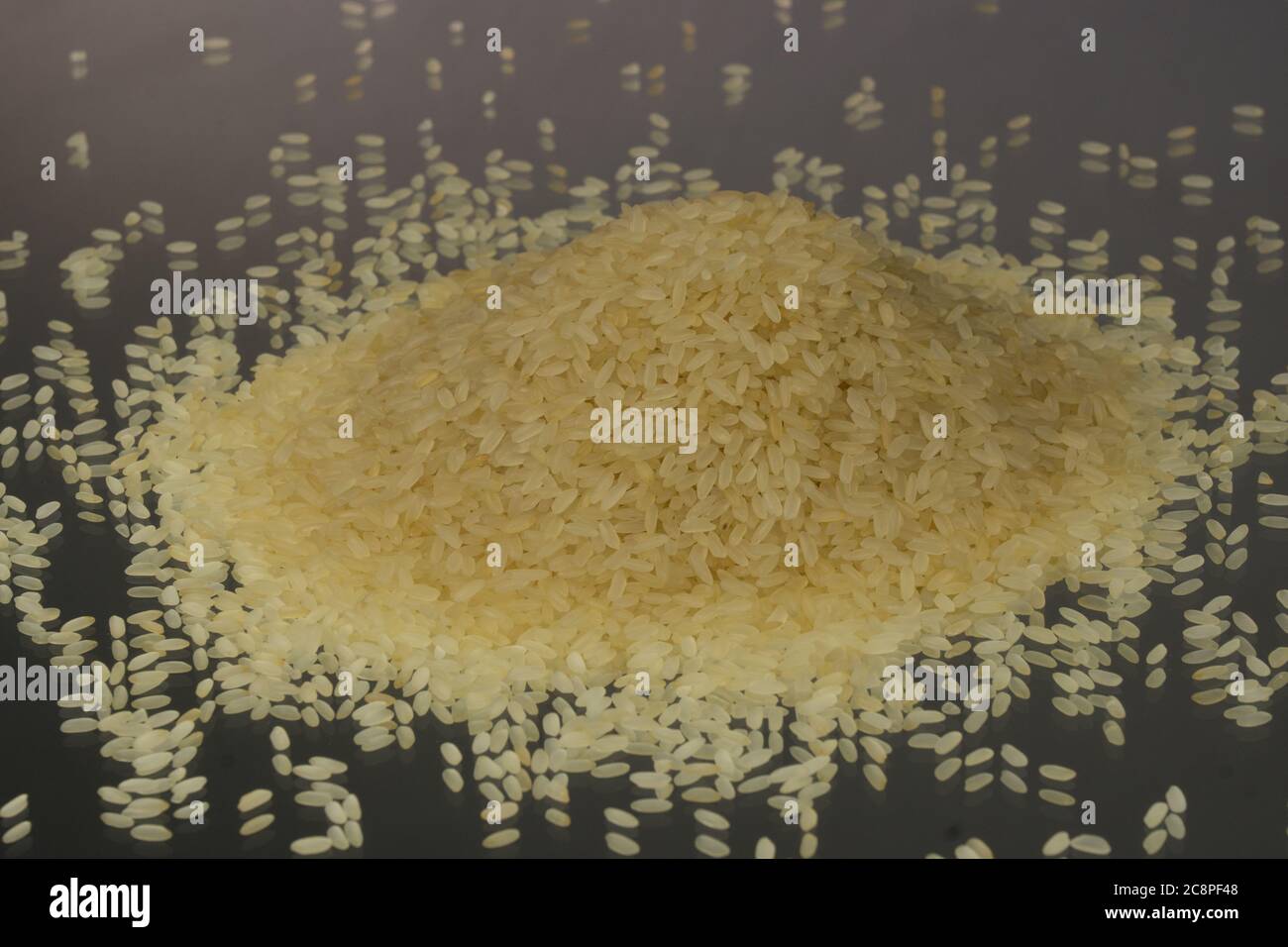 Studio Photo Rice Raw rice as background. Mirror. Studio photography Stock Photo - Alamy