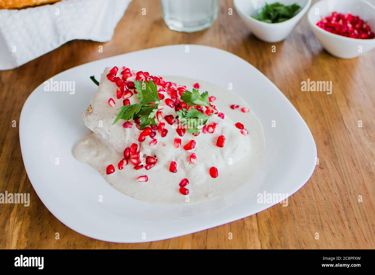 chiles en nogada, traditional Mexican dish with poblano chili peppers
