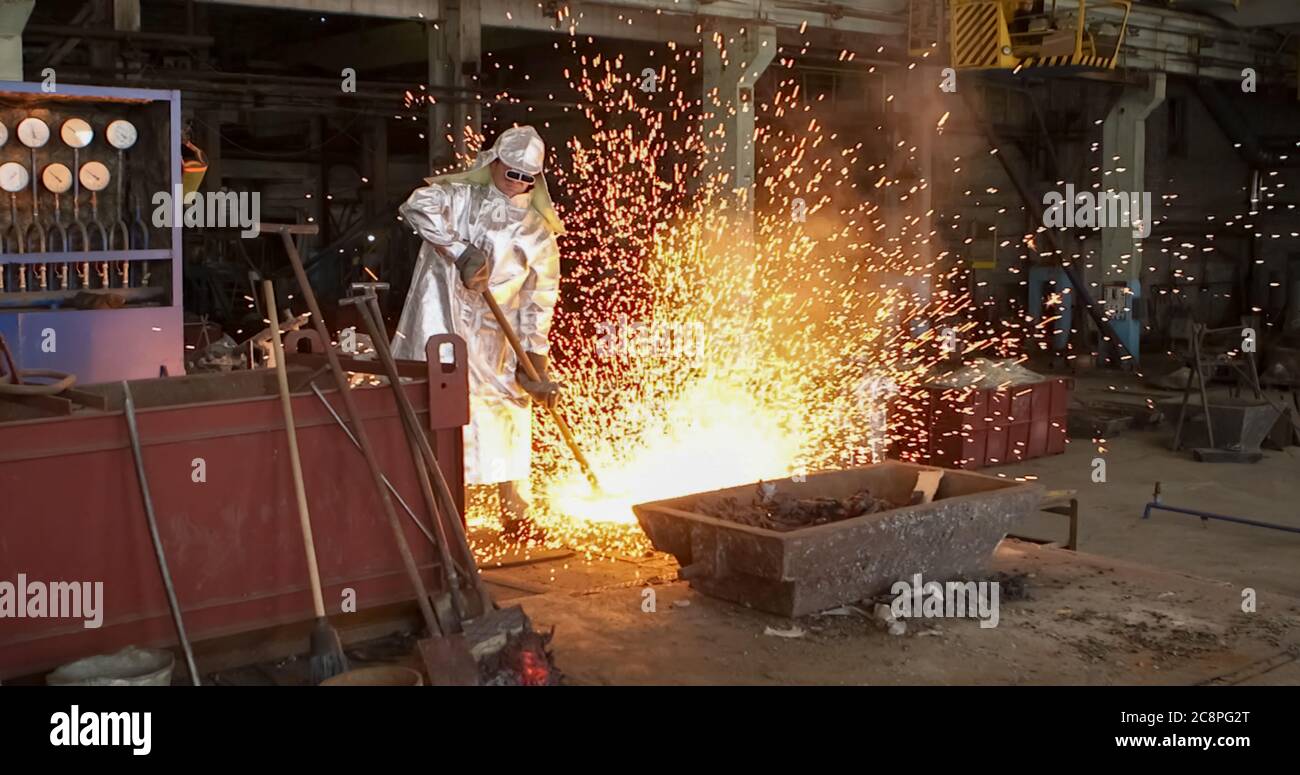 red-hot molten steel in a iron and steel enterprise production scene ...