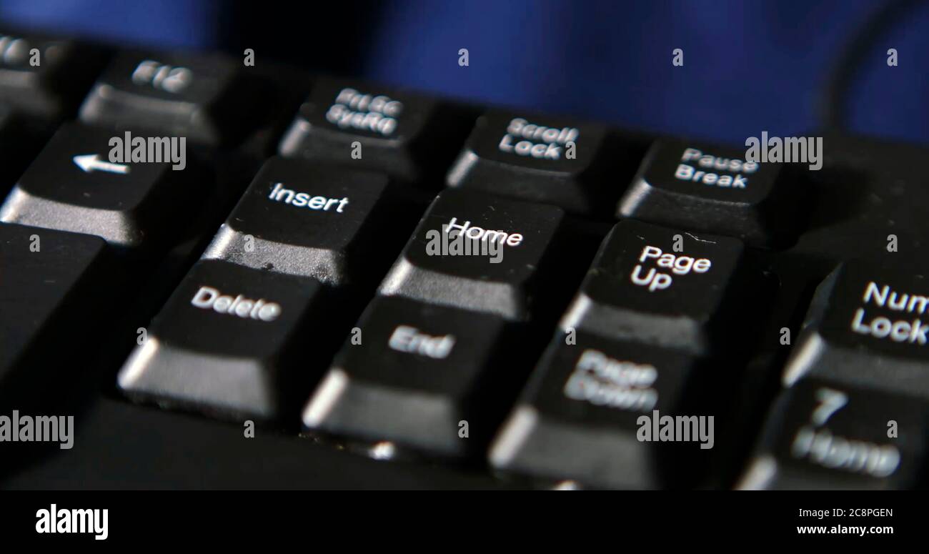 Black computer keyboard super close up stock footage. Black computer enter keys Stock Photo