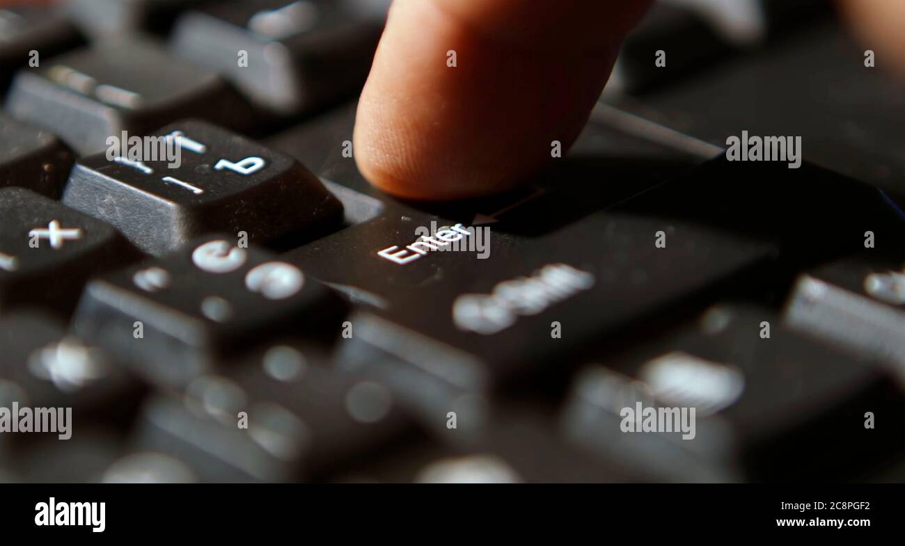 Black computer keyboard super close up stock footage. Black computer enter keys Stock Photo