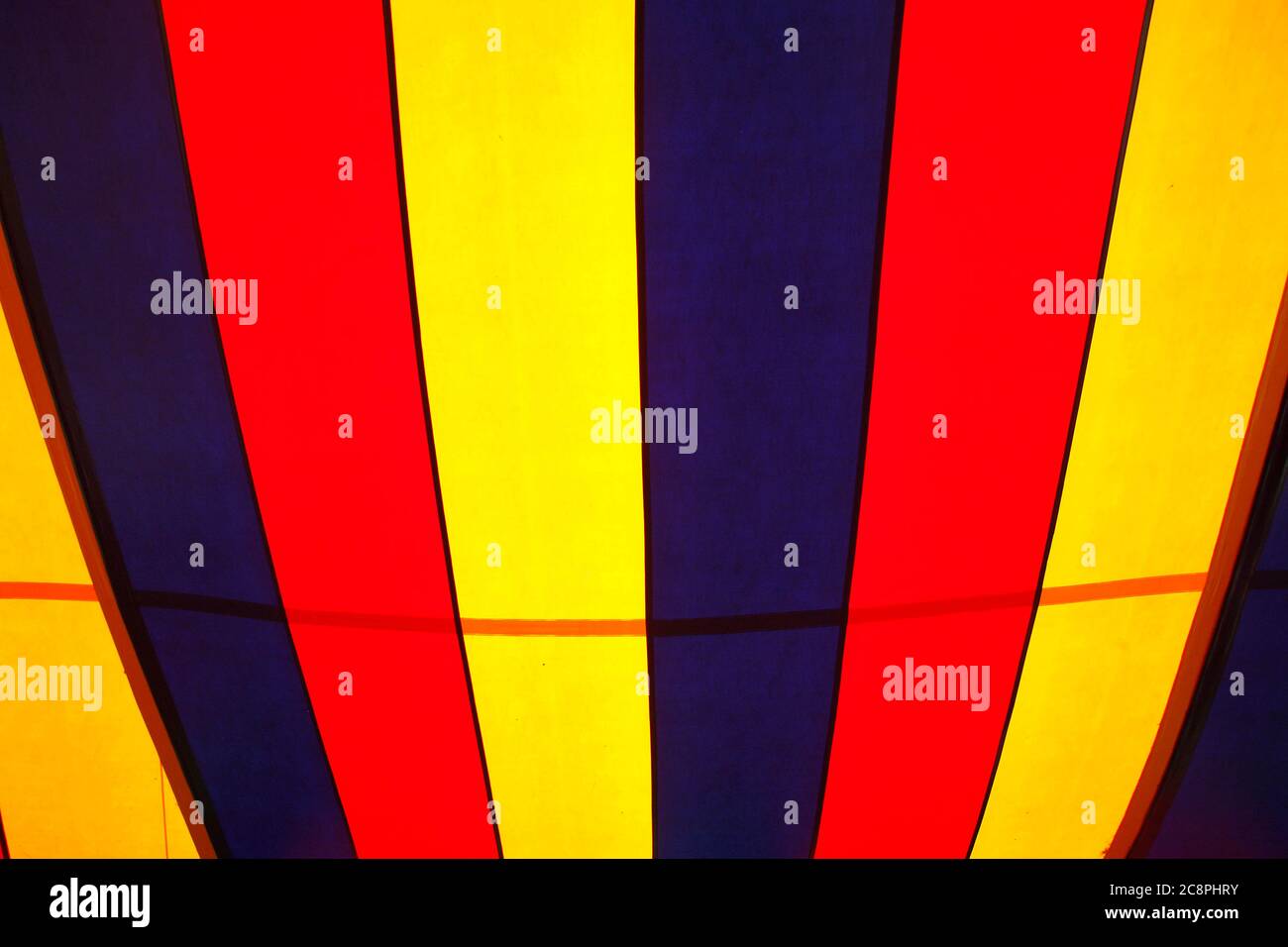 colorful circus tent top seen from inside Stock Photo