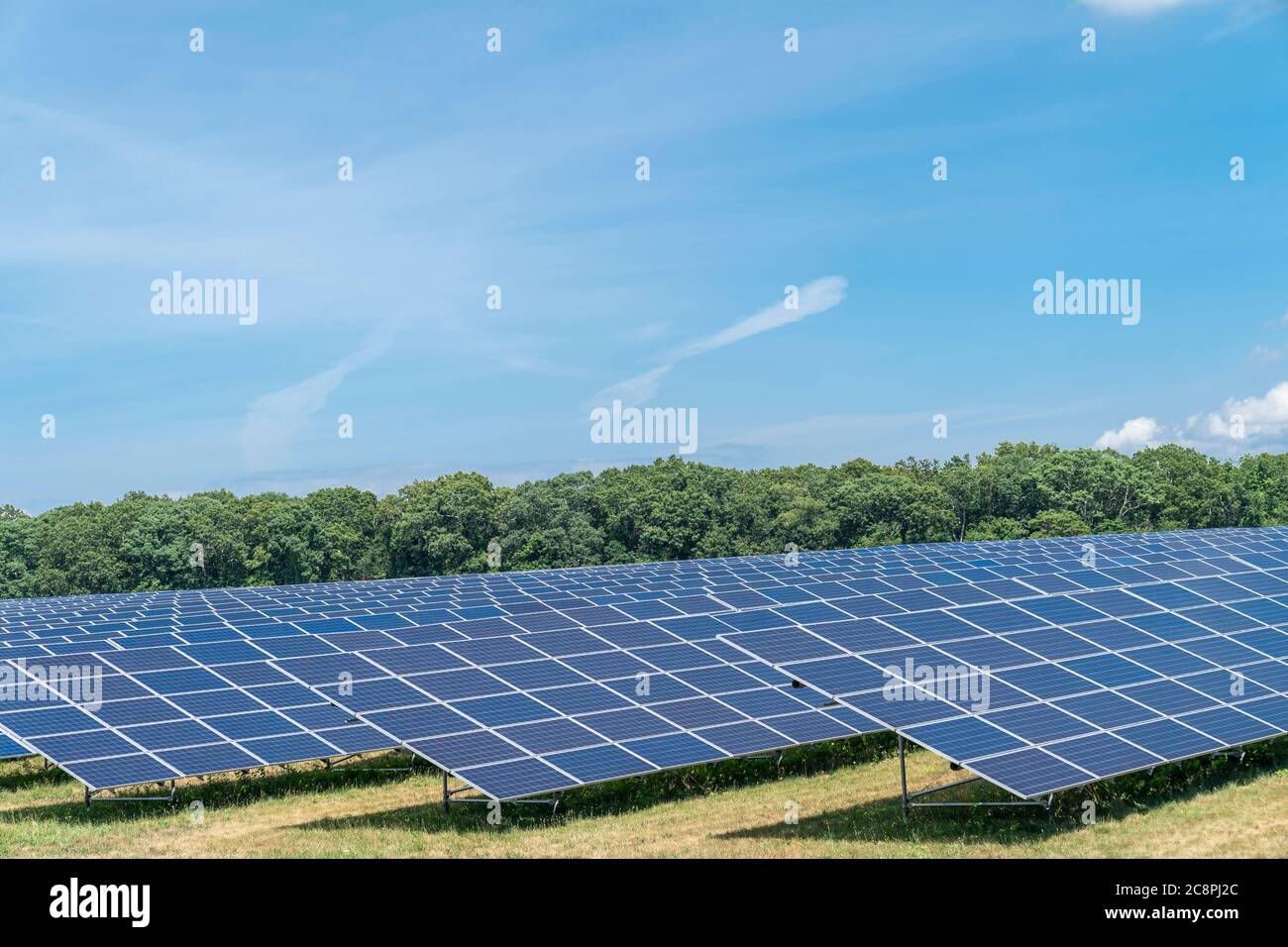 Solar photovoltaic power plant farm installation Stock Photo - Alamy