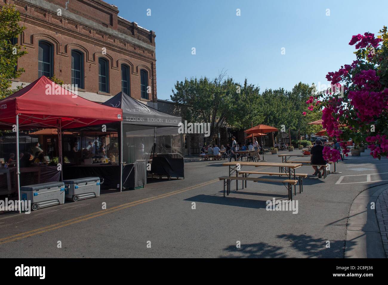 Winters, California, USA. July 25, 2020. The small town of Winters has closed a portion of the Main Street to allow restaurants to expand outside to allow customers dinning Stock Photo