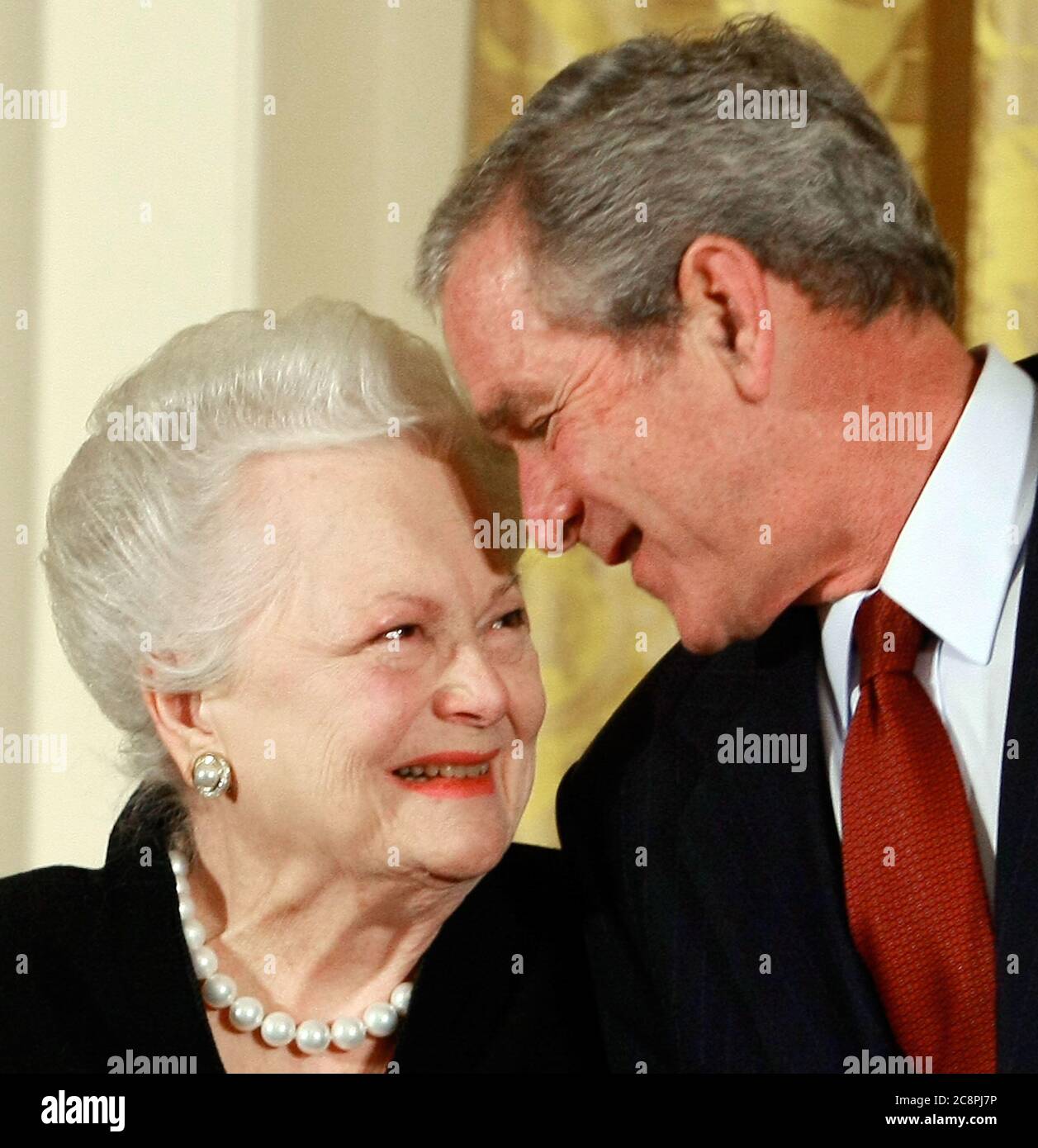 Washington, DC. 17th Nov, 2008. Washington, DC - November 17, 2008 -- United States President George W. Bush congratulates actress Olivia de Havilland before presenting her with the 2008 National Medals of Arts award during an event in the East Room at the White House on Monday, November 17, 2008 in Washington, DC. During the event president Bush presented recipients with awards for the National Medals of Arts and the National Humanities Medal. Credit: Mark Wilson - Pool via CNP | usage worldwide Credit: dpa/Alamy Live News Stock Photo