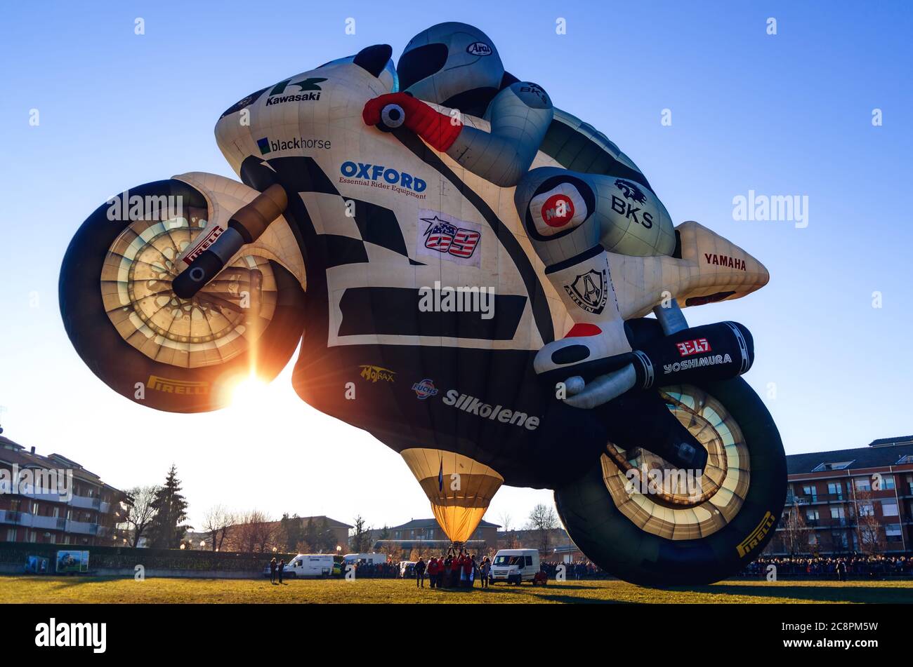 Mondovì, Italy - January 5, 2019: very big hot-air balloon shaped like a motorbike, just before the take off during the traditional epiphany festival Stock Photo