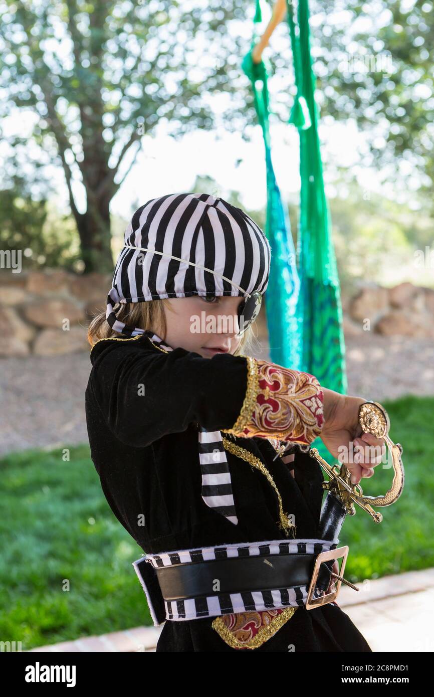 5 year old boy wearing pirate costume Stock Photo