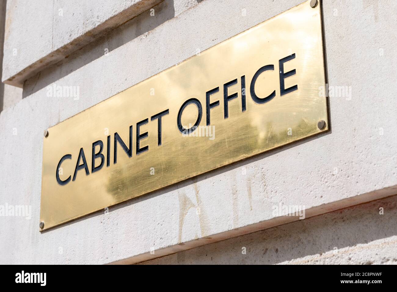 The brass name plate of the UK Cabinet Office with responsibility to support the Prime Minister and the effective running of the Cabinet. Stock Photo