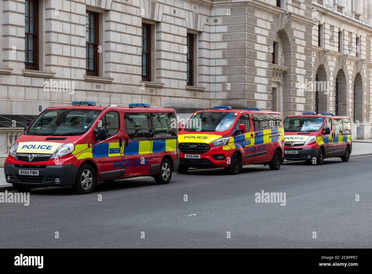 Police vehicles painted in the colours of the Metropolitan Police Diplomatic Protection Service for the safety of diplomats, ministers and royals. Stock Photo