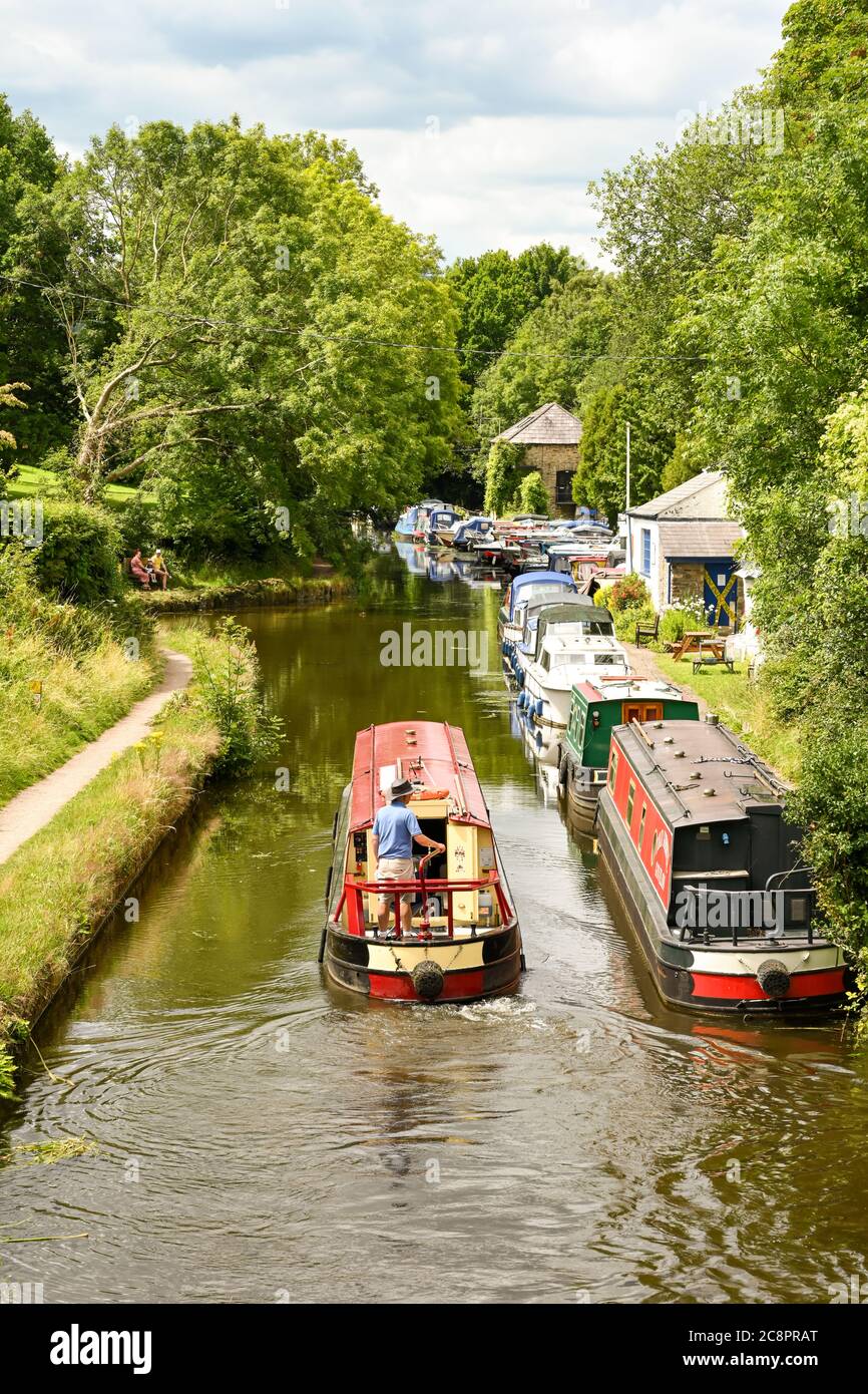 Llanfoist, Wales - July 2020: Narrow boat on the Brecon and Abergavenny canal at Llanfoist. Stock Photo