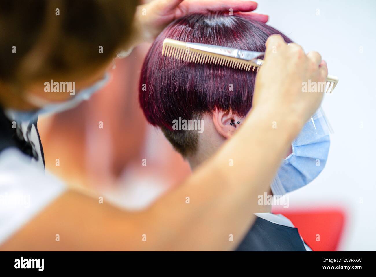 Hairdresser with precaution hires stock photography and images Alamy