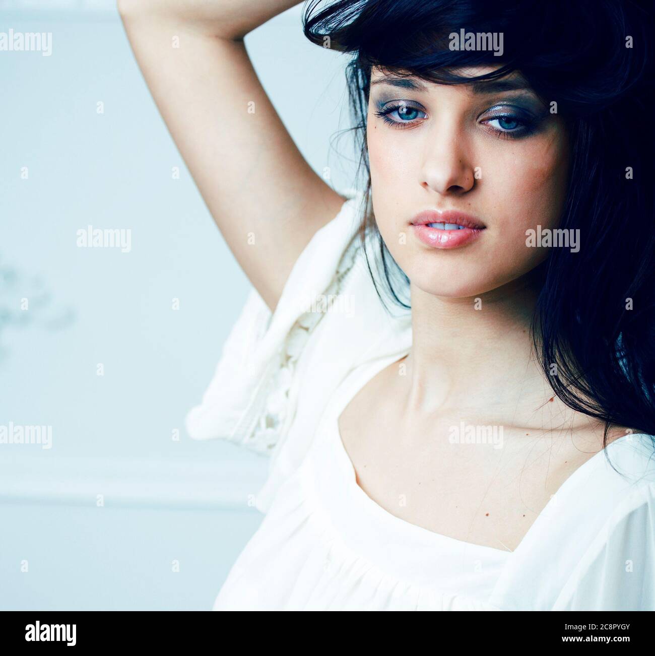 young pretty brunette woman smiling happy on white background smooth ...