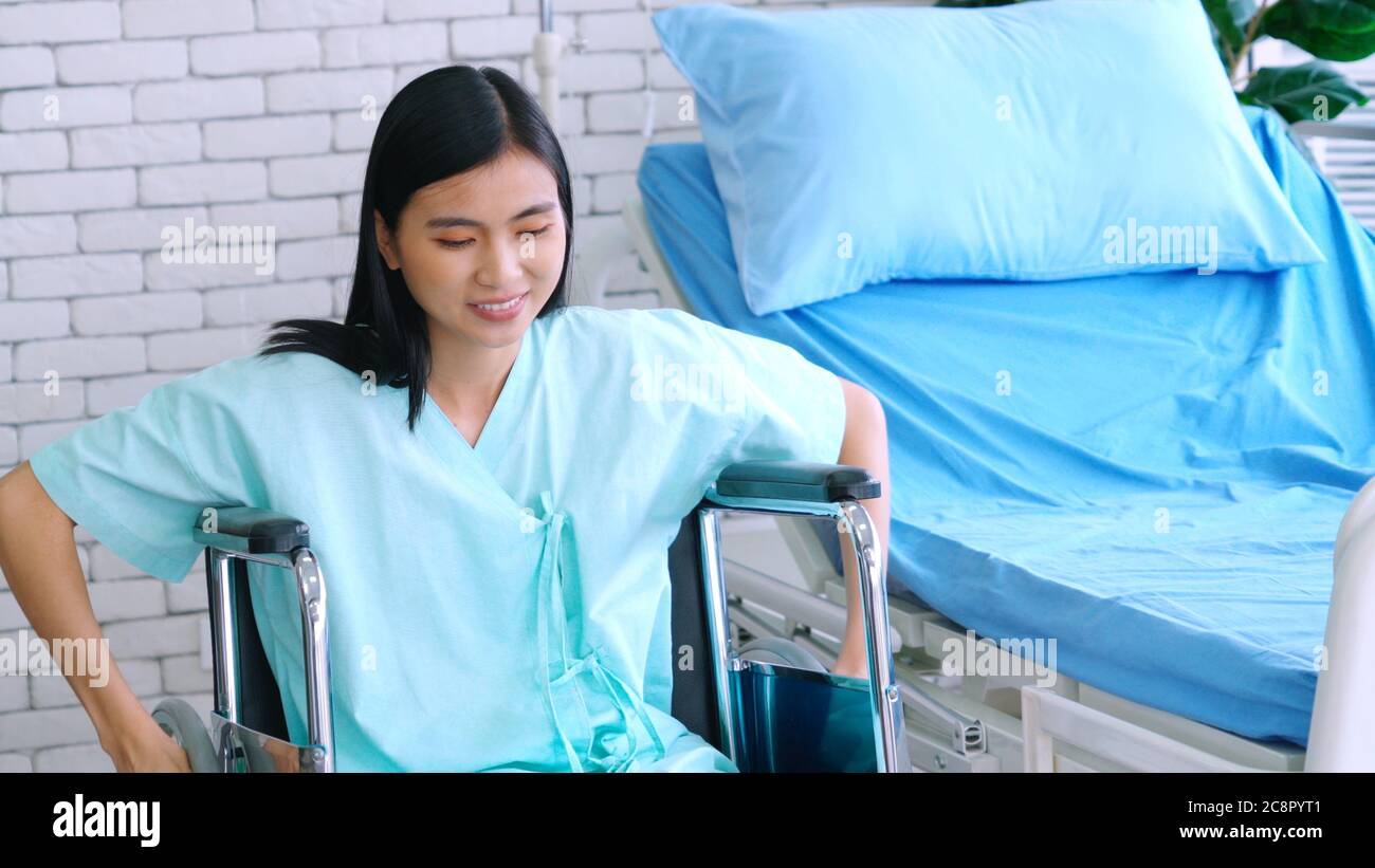 Asian girl sitting on hospital hi-res stock photography and images - Alamy