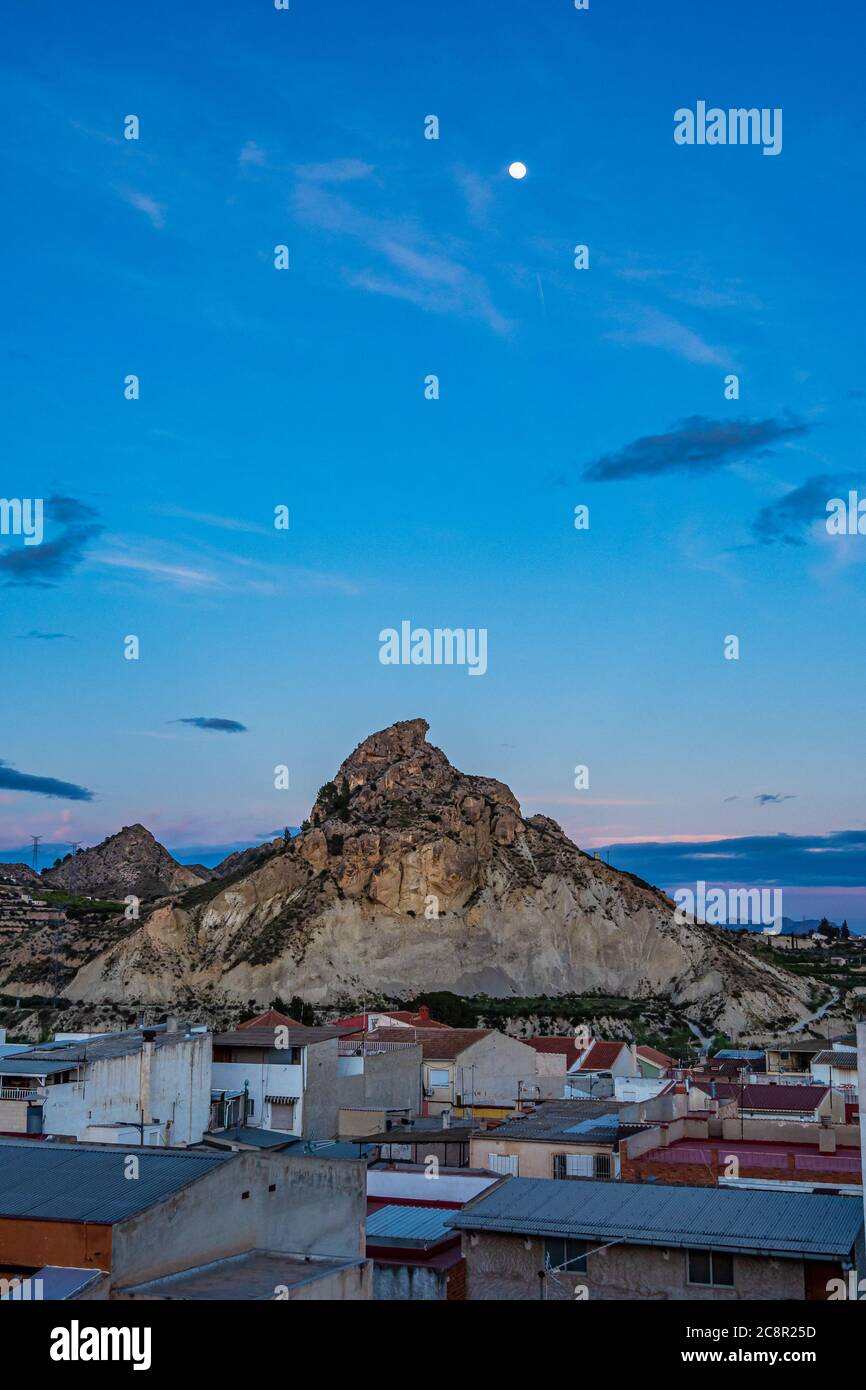 Sunset view of Archena with its mountains and the moon in Balneario de Archena, Murcia region of Spain. Stock Photo