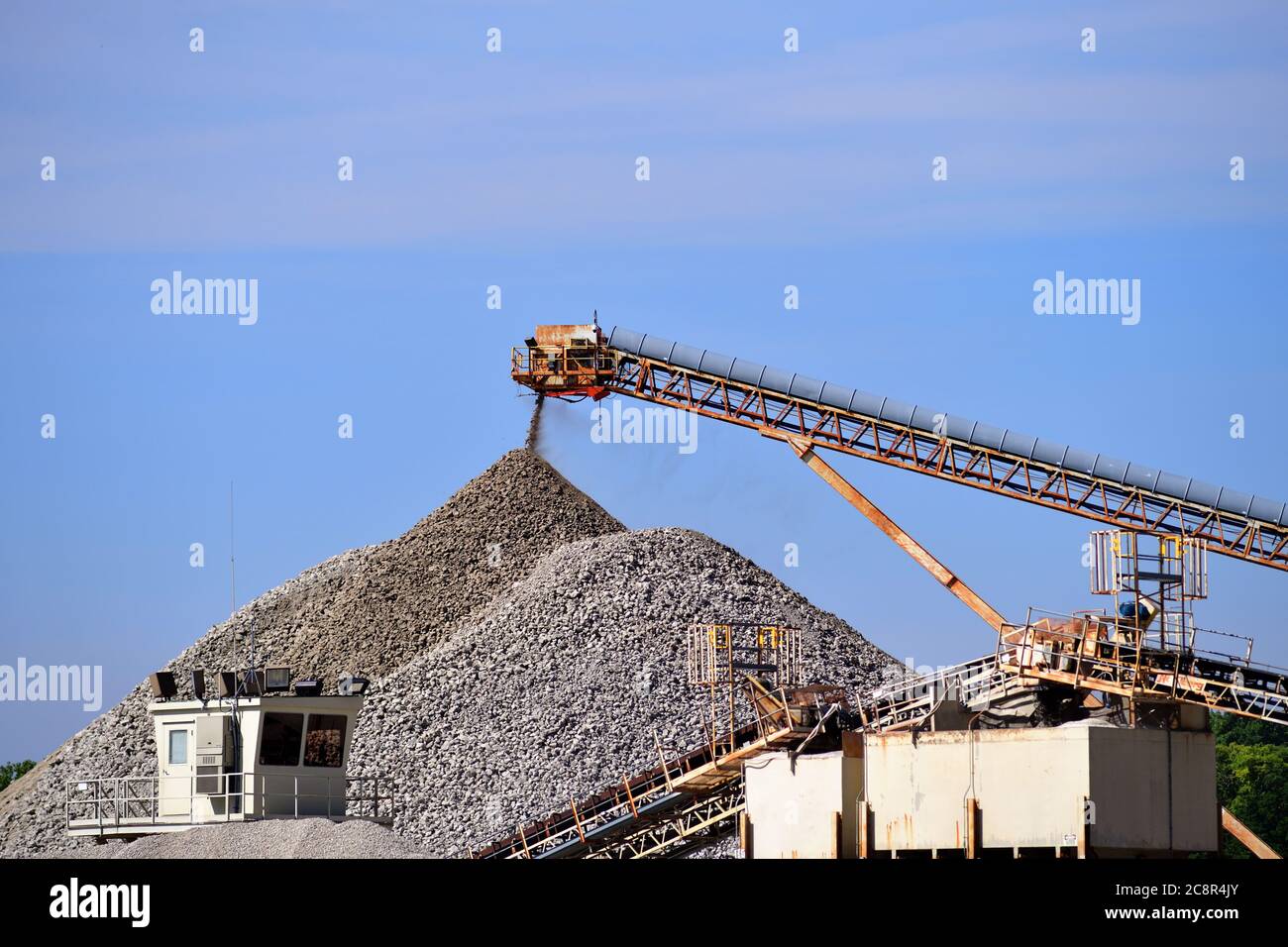 South Elgin, Illinois, USA. Raw product being stock piled via conveyor at a large concrete processing facility in the Chicago suburbs. Stock Photo