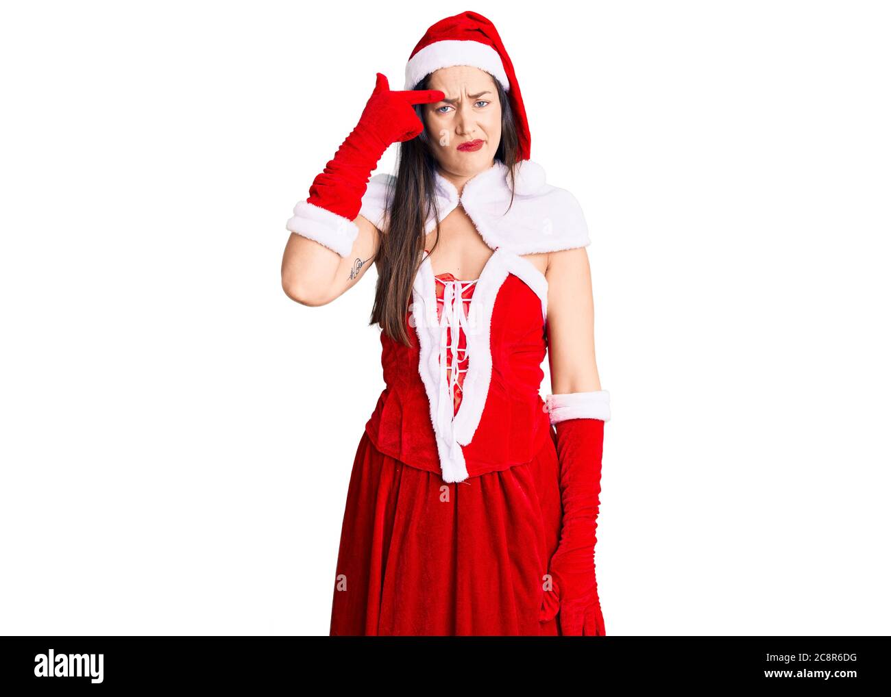 Young beautiful caucasian woman wearing santa claus costume pointing  unhappy to pimple on forehead, ugly infection of blackhead. acne and skin  problem Stock Photo - Alamy
