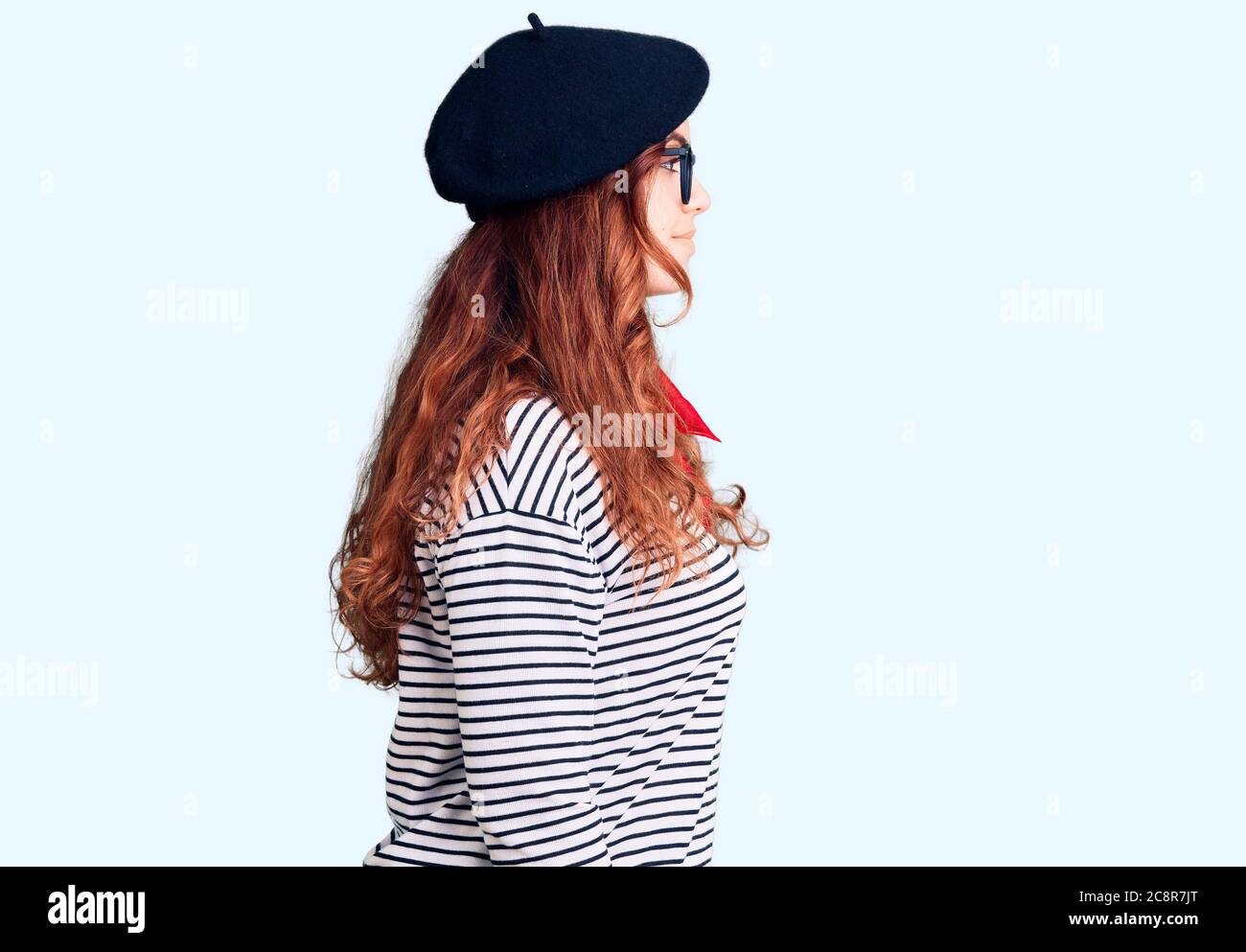 Young Beautiful Woman Wearing French Look With Beret Looking To Side Relax Profile Pose With Natural Face With Confident Smile Stock Photo Alamy
