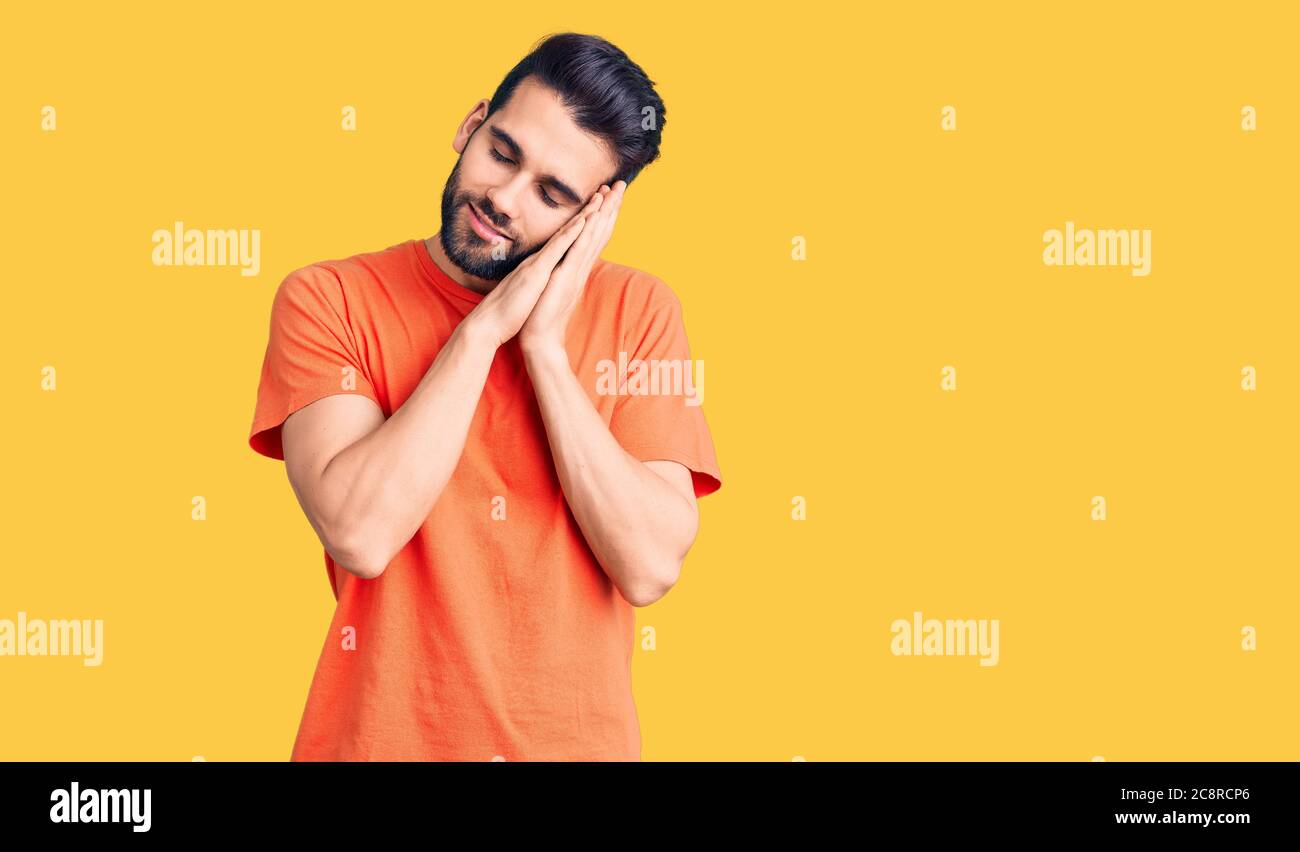 Young Handsome Man With Beard Wearing Casual T shirt Sleeping Tired 