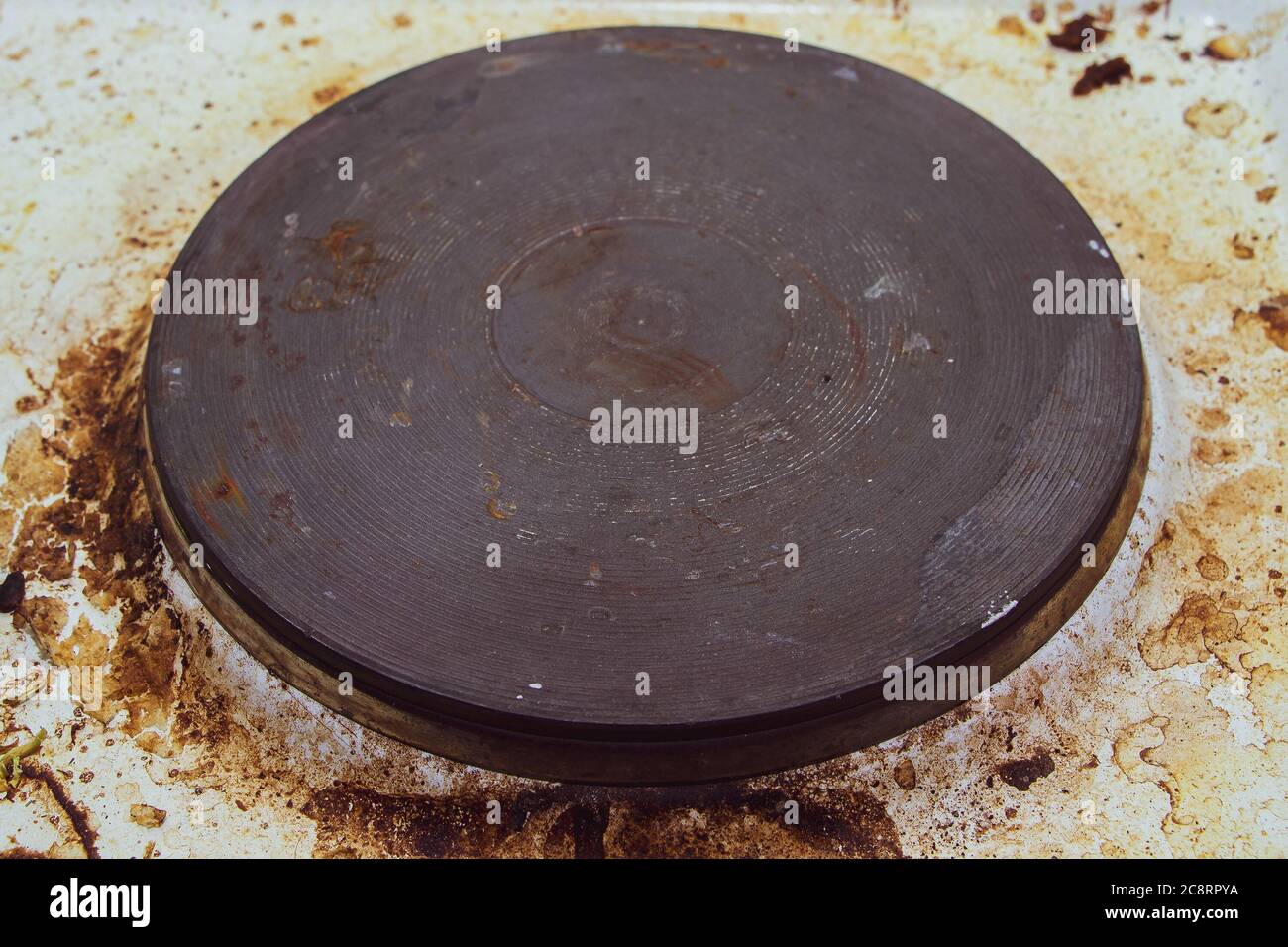 Dirt and grease on the white electric stove Stock Photo Alamy