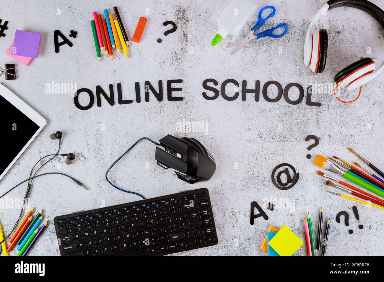 Tablet, Keyboard With School Supplies On White Board. Homeschool Or 