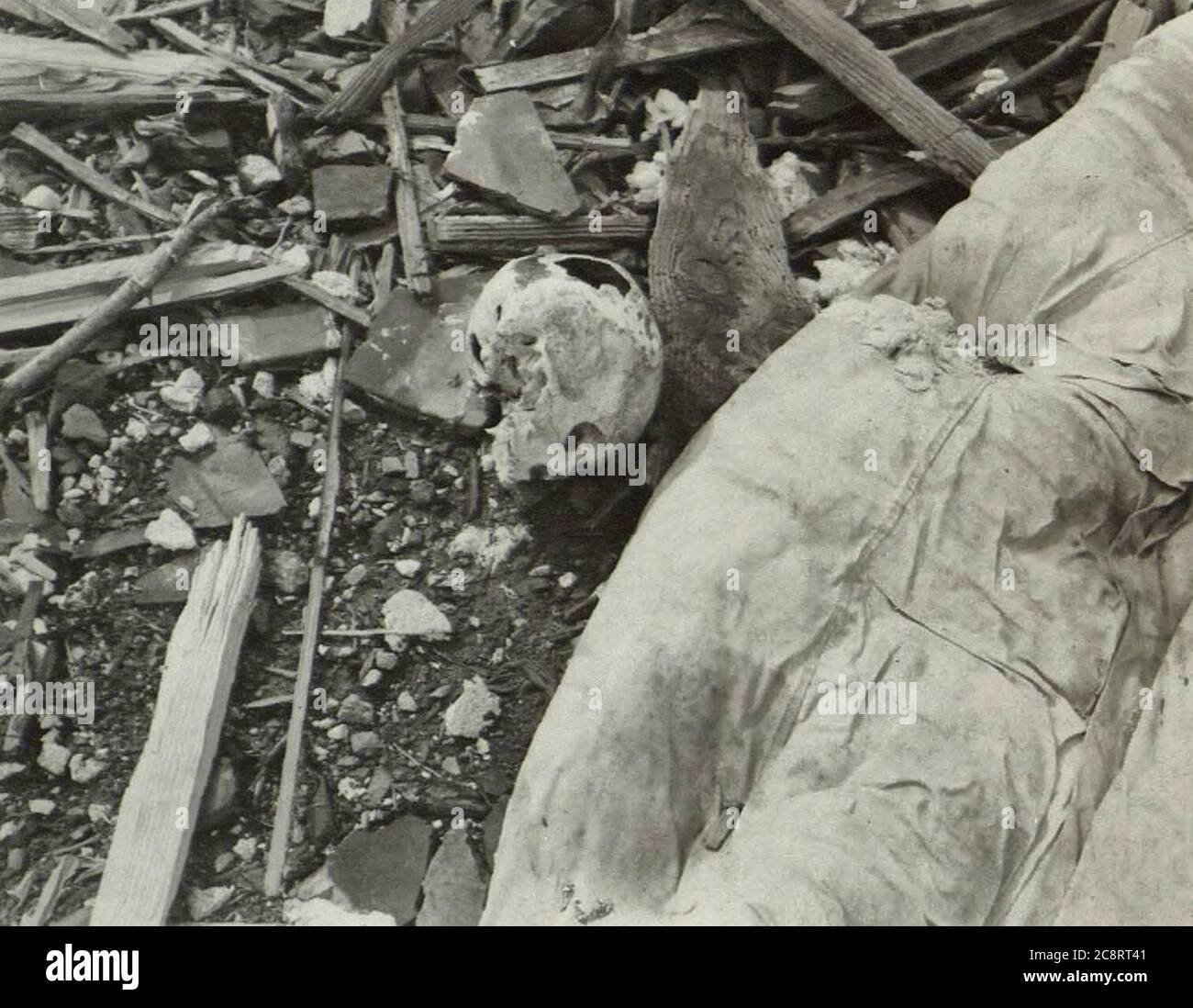 A skull among the ruins in the city of Hiroshima, Japan after the Atomic Bomb attack - late 1945 or early 1946 Stock Photo