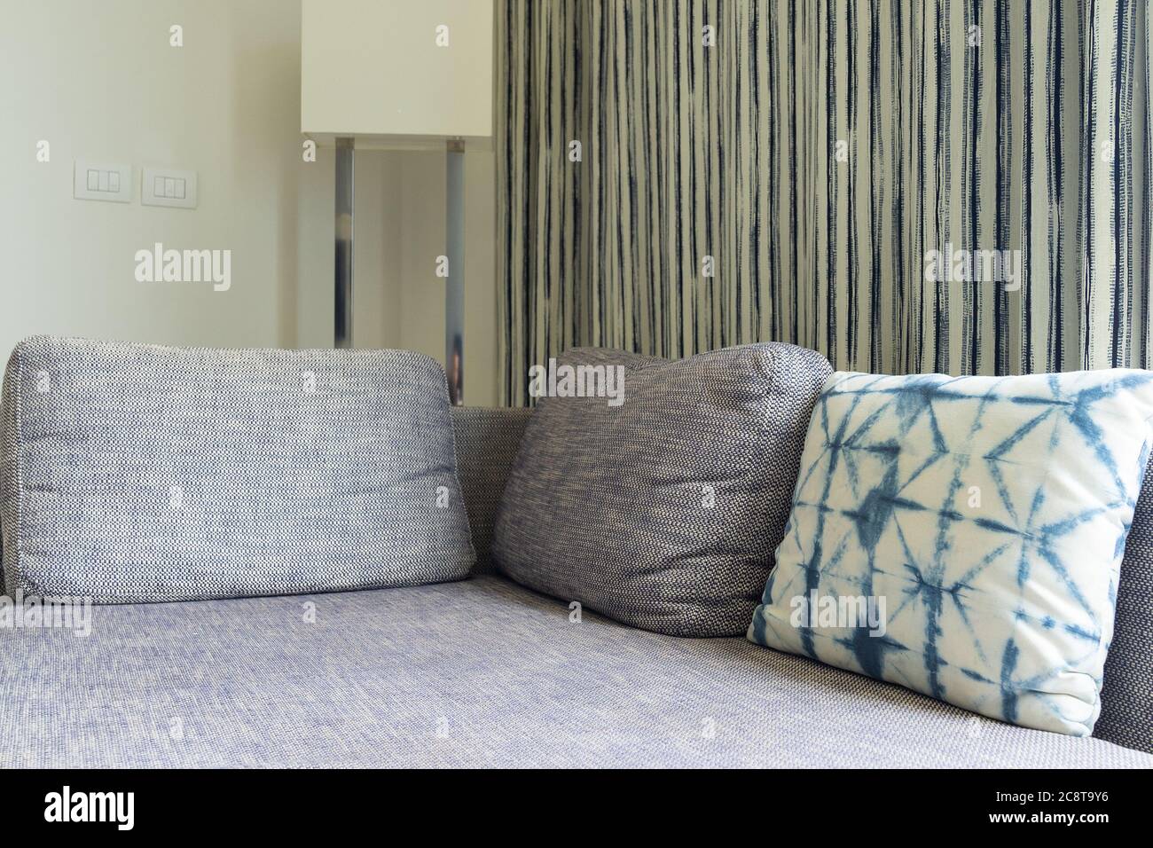 Modern sofa bed set in luxury hotel. Stock Photo