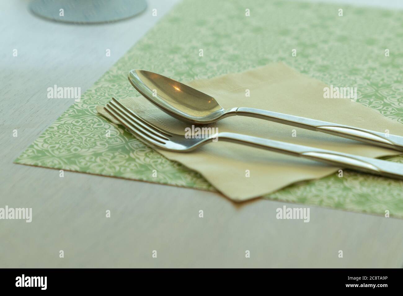 Antique Silverware Place Setting, a Table Cloth with Room for Text or Copy. Stock Photo