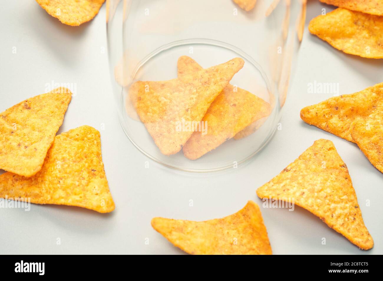 Isolation concept. Two chips into glass house Stock Photo